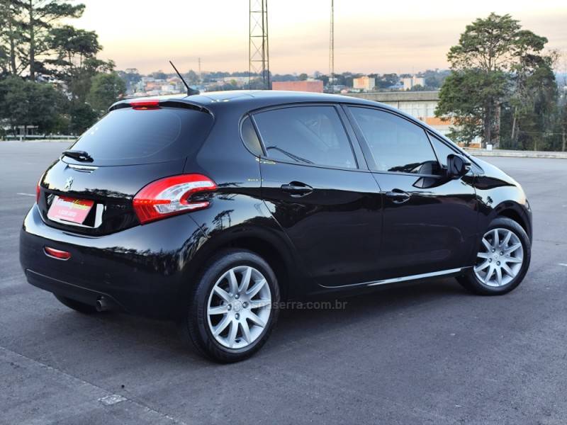 PEUGEOT - 208 - 2015/2016 - Preta - R$ 47.900,00